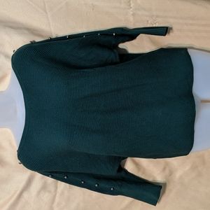 Jennifer Lopez green sweater